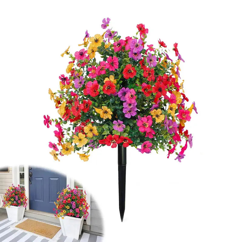 Kunstmatige eucalyptus en viooltjes als bloemdecoratie voor in de grond.